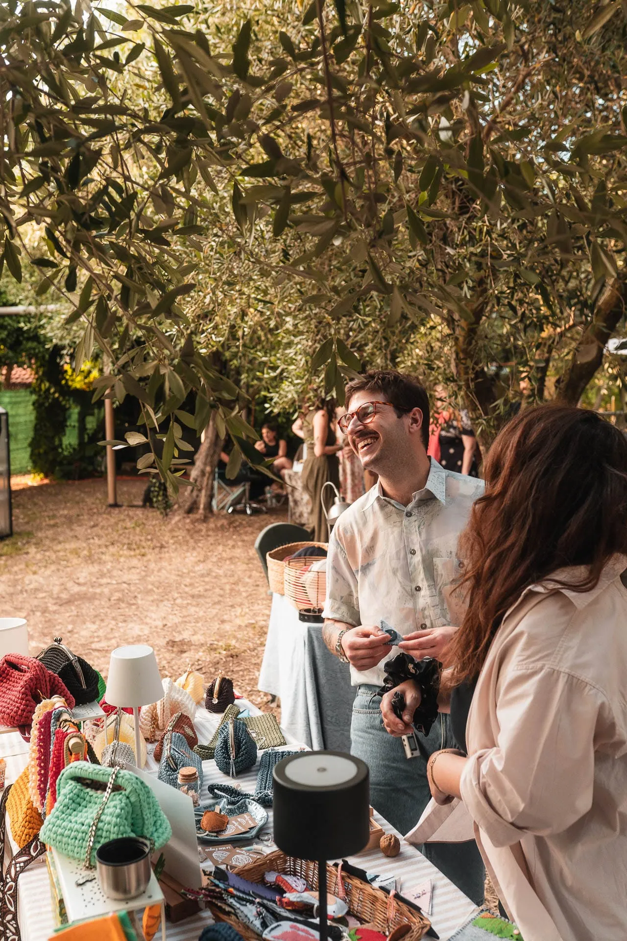 Exhibitors and visitors chatting at a stall
